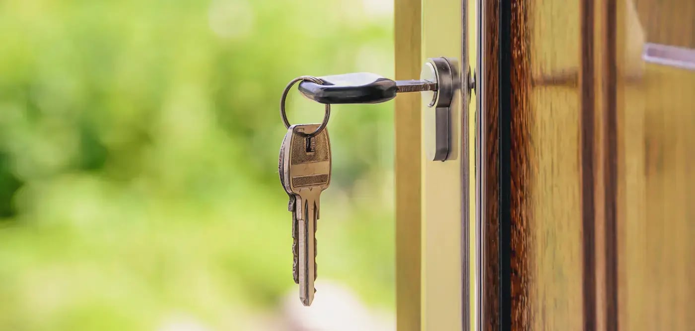 symbol for mortgage keys in from door lock