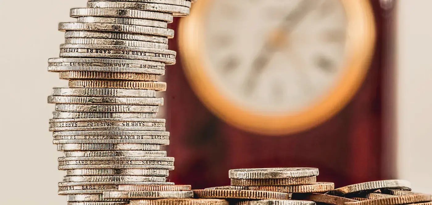 symbolizing finance schedule with money and clock
