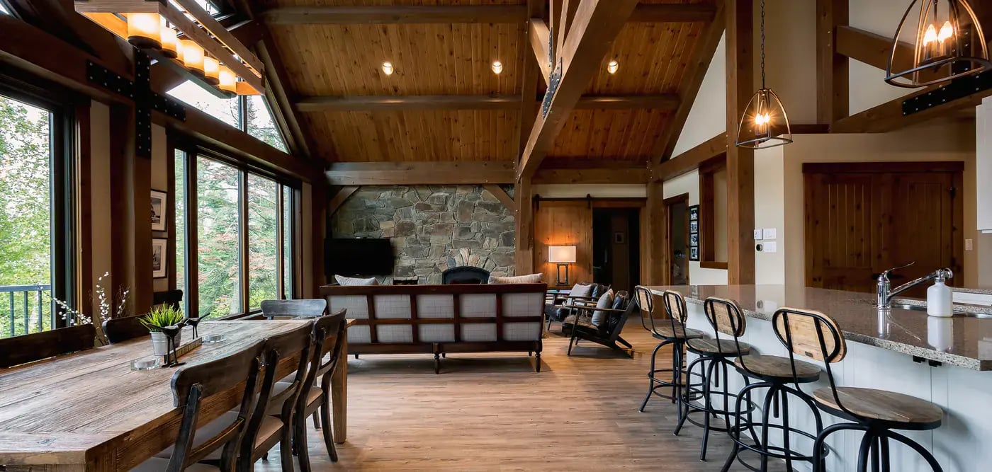 Open concept kitchen with a dining area, kitchen, and living room with fireplace