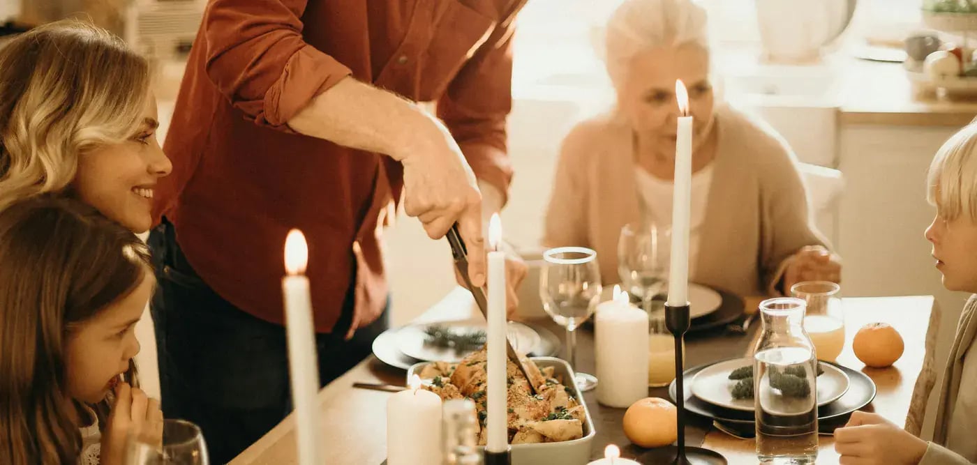 family-having-dinner-at-dining-table