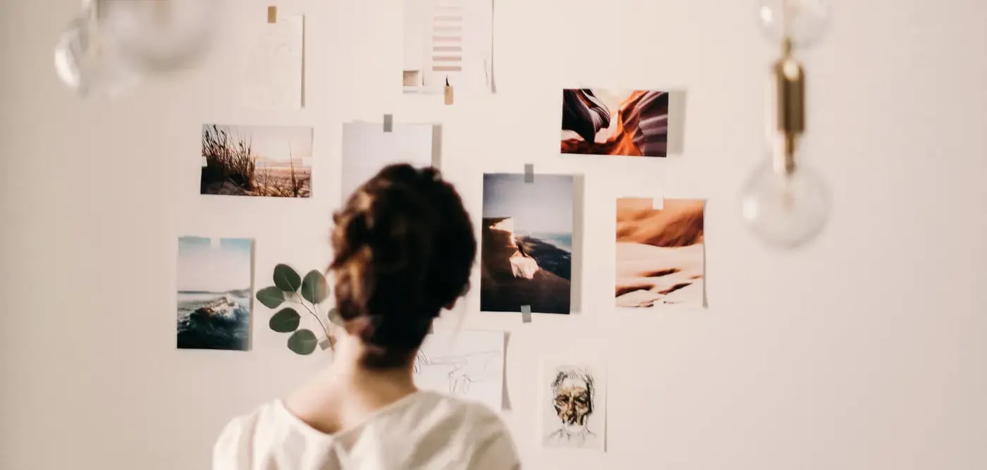 View of Back of Woman’s Head looking at vision board